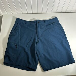 Lightweight navy blue Magellan fish shorts, gently worn